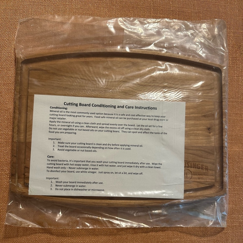 NIP; Usinger Wooden Cutting Board